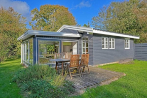 Sommerhus tæt på sandstrand og skov in Højby